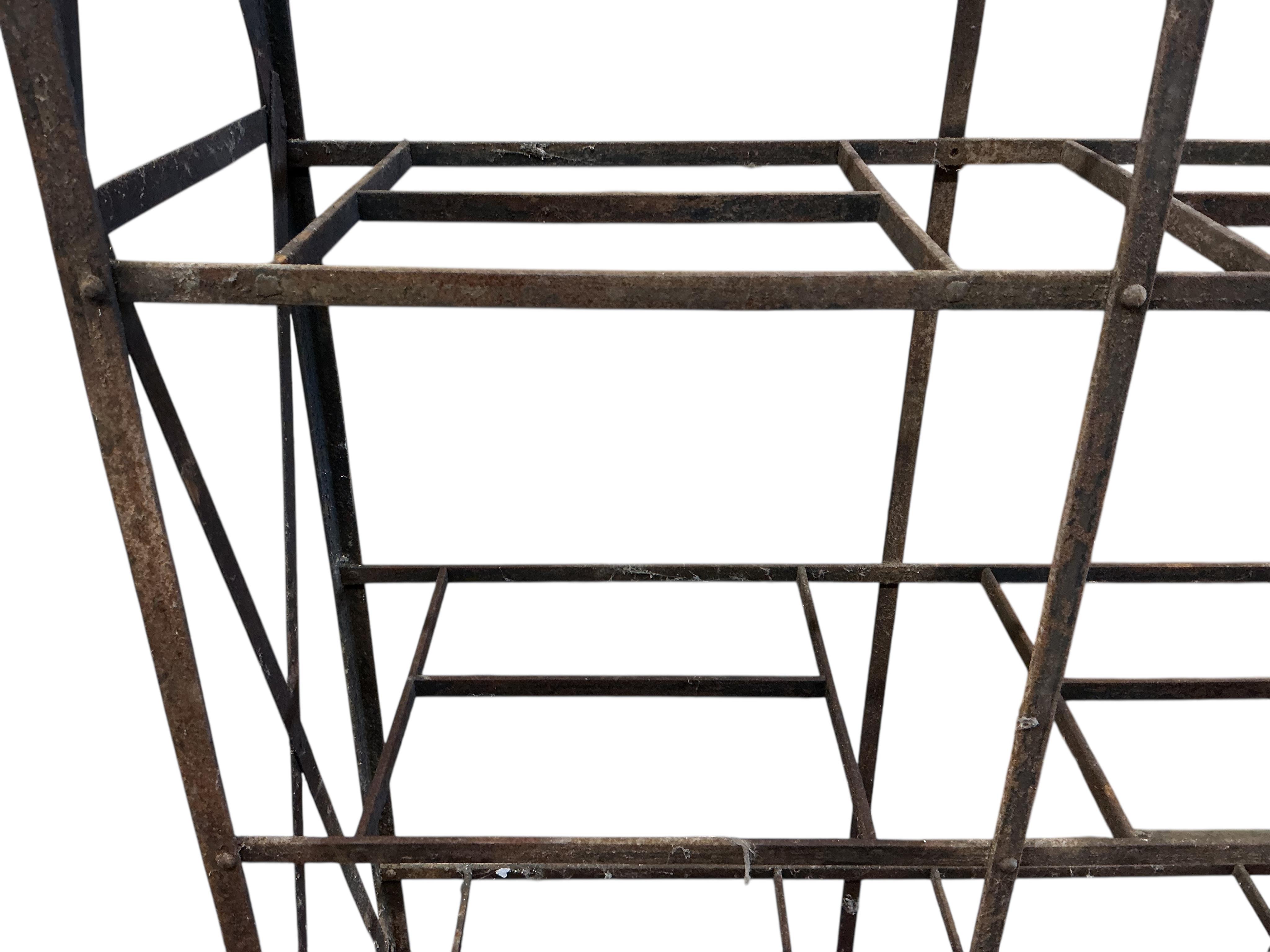 A 19th century blacksmith made five tier rack, width 107cm, depth 36cm, height 235cm
